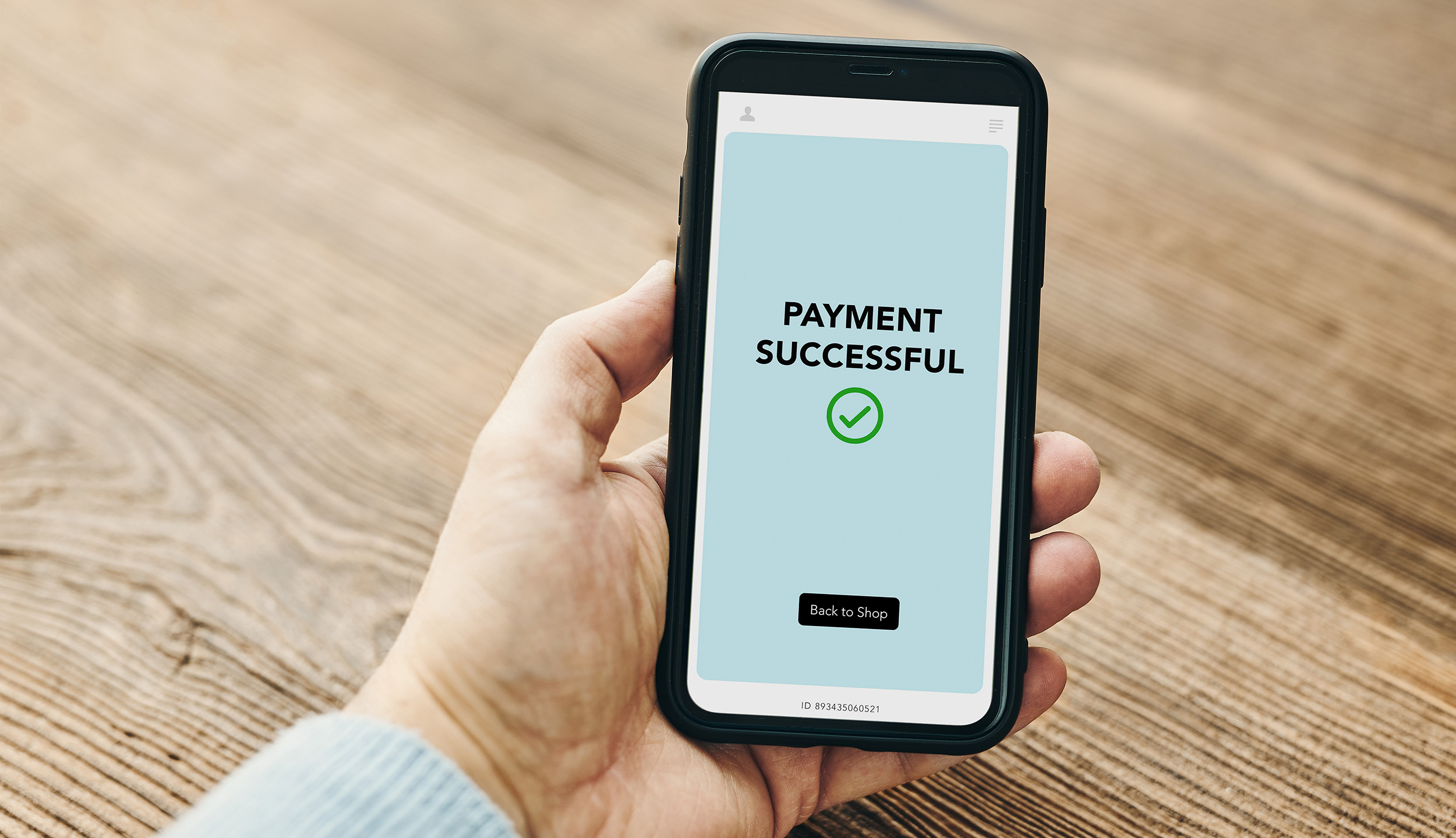 Man paying with smartphone for online shopping. Paying using fast secure payment system. Paying bills using express payment technology. Paying expenses online. Ordering product online using smartphone. Confirmation payment successful displayed in store ap